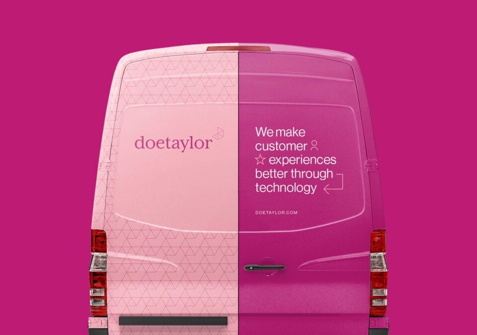 A branded Doe Taylor delivery van with a split design, showcasing their technology-driven approach to improving customer experiences.