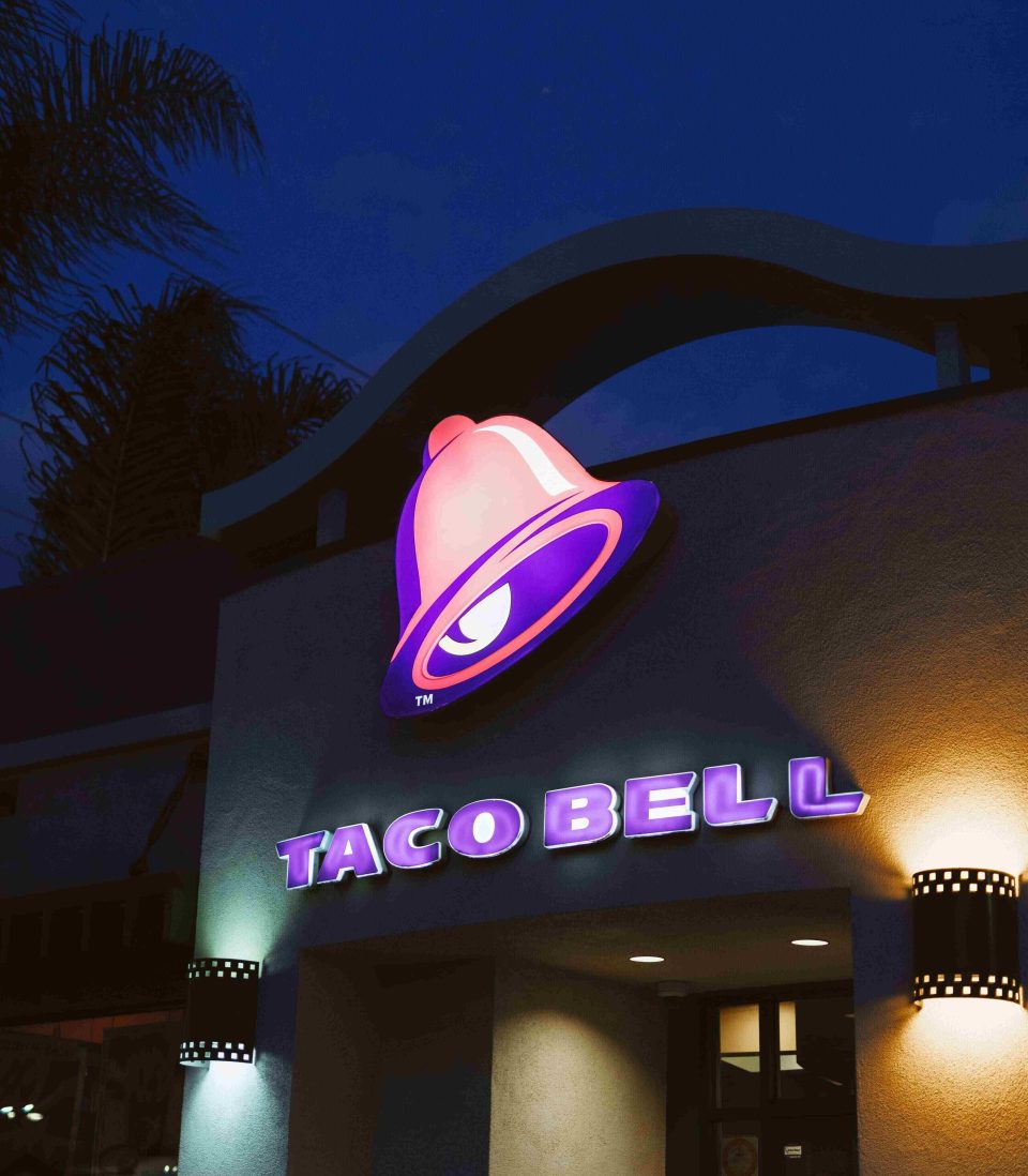 Outside view of Taco Bell restaurant at night.