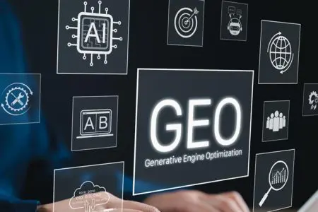 A person typing on a laptop with transparent digital icons floating above the keyboard, including a large central label reading “GEO – Generative Engine Optimization,” surrounded by symbols for AI, analytics, targeting, A/B testing, global reach, and search.