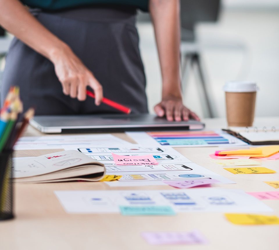 Website designer looking at design ideas for a site build