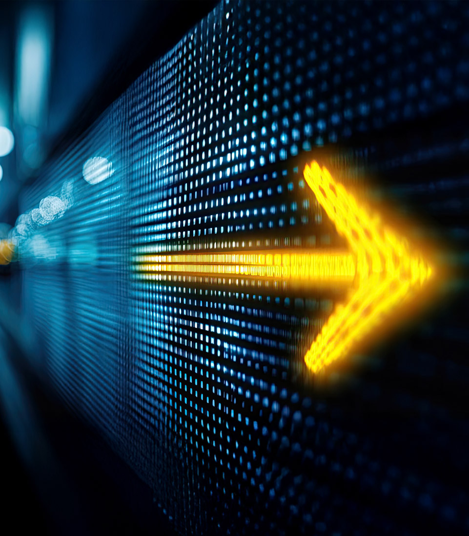 A glowing yellow arrow on a digital LED wall, symbolising progress, direction, and forward movement.