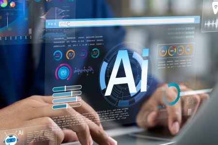 Business professional working on a laptop with futuristic AI data interfaces and analytics dashboards overlaying the screen, symbolizing artificial intelligence technology, machine learning, and data-driven innovation in business.