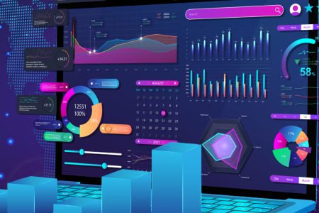 Laptop displaying analytics dashboards and growth charts.